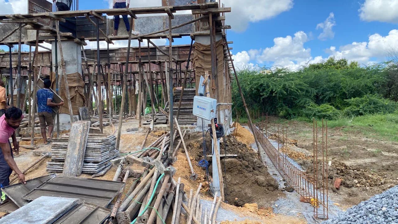 Scaffolding and timber formwork supporting the roof slab while it is cast